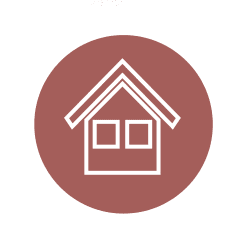 Residential subdivision land surveying icon featuring a house, representing lot development services in Nelson, BC.